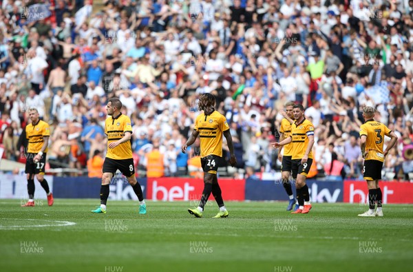 250519 - Newport County v Tranmere Rovers - SkyBet League Two Play-off Final - Dejected Adebayo Azeez of Newport County and team mates