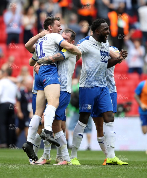 250519 - Newport County v Tranmere Rovers - SkyBet League Two Play-off Final - Connor Jennings celebrates with James Norwood of Tranmere Rovers at full time