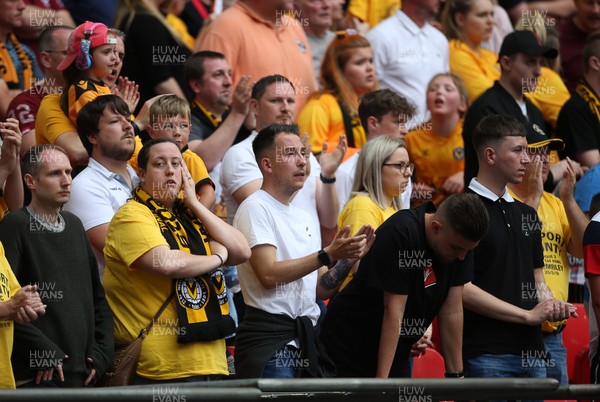 250519 - Newport County v Tranmere Rovers - SkyBet League Two Play-off Final - Dejected County fans