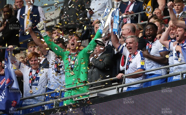 250519 - Newport County v Tranmere Rovers - SkyBet League Two Play-off Final - Scott Davies and Steve McNulty of Tranmere Rovers lift the trophy