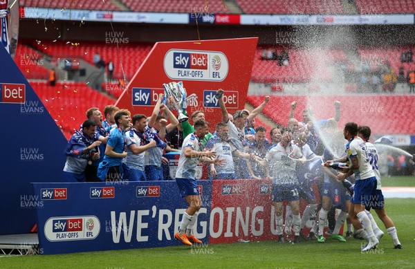 250519 - Newport County v Tranmere Rovers - SkyBet League Two Play-off Final - Tranmere celebrate winning with the trophy