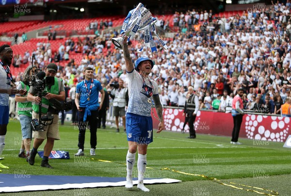 250519 - Newport County v Tranmere Rovers - SkyBet League Two Play-off Final - James Norwood of Tranmere Rovers celebrates with the trophy in front of the fans