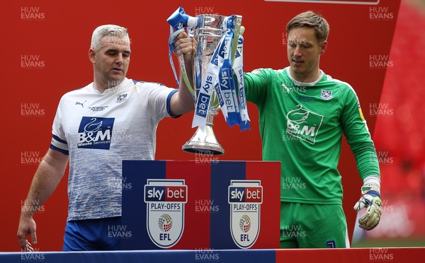 250519 - Newport County v Tranmere Rovers - SkyBet League Two Play-off Final - Steve McNulty and Scott Davies of Tranmere Rovers with the trophy