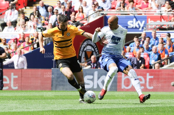 250519 - Newport County v Tranmere Rovers, Sky Bet League 2 Play-Off Final - Padraig Amond of Newport County takes on Jake Caprice of Tranmere Rovers
