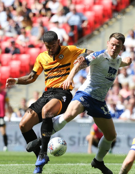 250519 - Newport County v Tranmere Rovers, Sky Bet League 2 Play-Off Final - Joss Labadie of Newport County and Connor Jennings of Tranmere Rovers compete for the ball