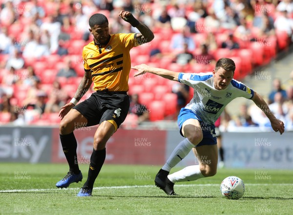 250519 - Newport County v Tranmere Rovers, Sky Bet League 2 Play-Off Final - Joss Labadie of Newport County and Connor Jennings of Tranmere Rovers compete for the ball