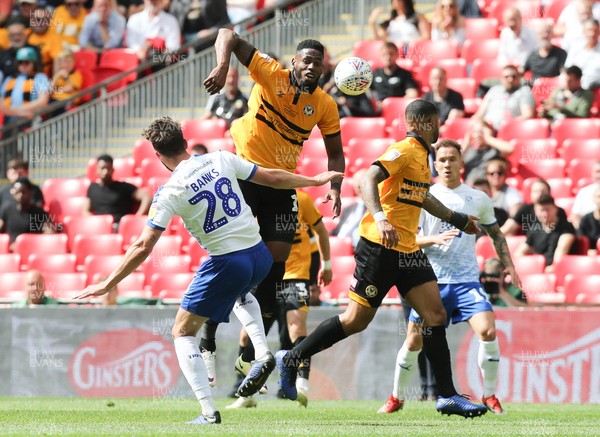 250519 - Newport County v Tranmere Rovers, Sky Bet League 2 Play-Off Final - Jamille Matt of Newport County and Oliver Banks of Tranmere Rovers compete for the ball