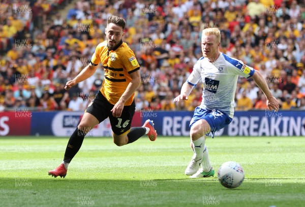 250519 - Newport County v Tranmere Rovers, Sky Bet League 2 Play-Off Final - Josh Sheehan of Newport County gets past David Perkins of Tranmere Rovers