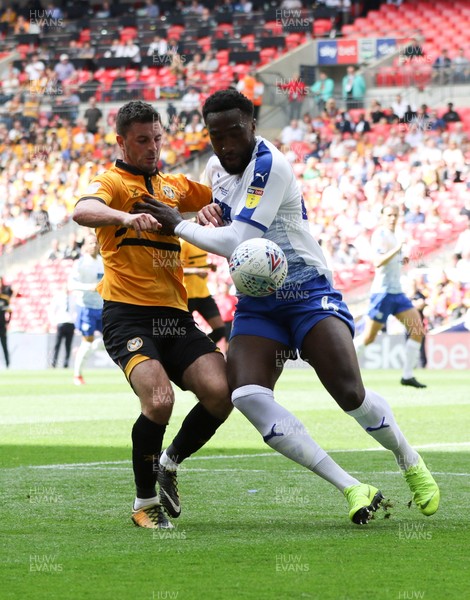 250519 - Newport County v Tranmere Rovers, Sky Bet League 2 Play-Off Final - Padraig Amond of Newport County and Sid Nelson of Tranmere Rovers compete for the ball