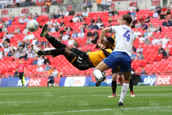 250519 - Newport County v Tranmere Rovers, Sky Bet League 2 Play-Off Final - Jamille Matt of Newport County tries to get a shot at goal past Sid Nelson of Tranmere Rovers