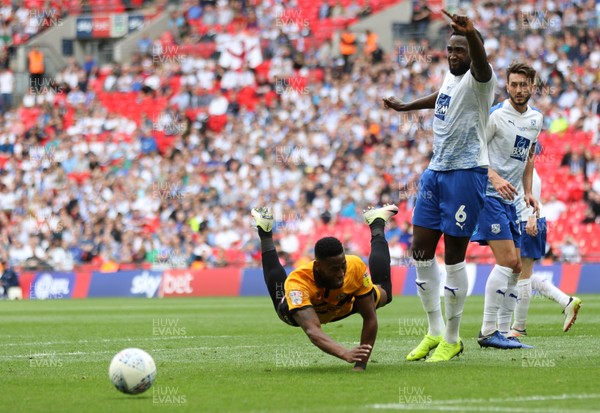 250519 - Newport County v Tranmere Rovers, Sky Bet League 2 Play-Off Final - Jamille Matt of Newport County is brought down by Emmanuel Monthe of Tranmere Rovers but is denied a penalty
