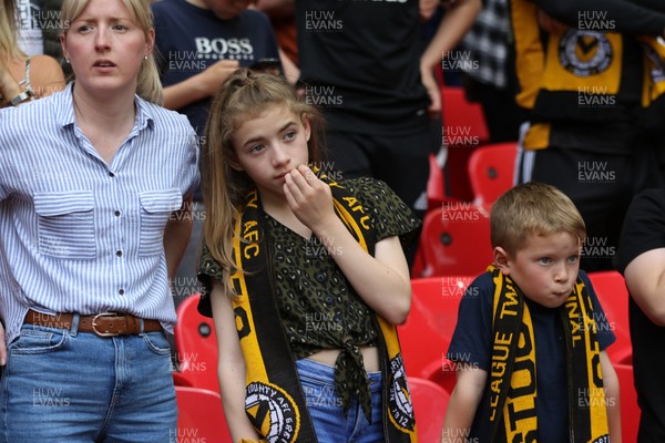 250519 - Newport County v Tranmere Rovers, Sky Bet League 2 Play-Off Final - Newport County fans react after seeing their team lose to Tranmere Rovers in the League 2 Play Off Final