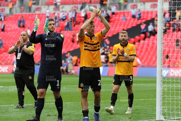 250519 - Newport County v Tranmere Rovers, Sky Bet League 2 Play-Off Final - Newport County goalkeeper Joe Day and Mickey Demetriou of Newport County applauds the fans after Newport County lose to Tranmere Rovers in the League 2 Play Off Final