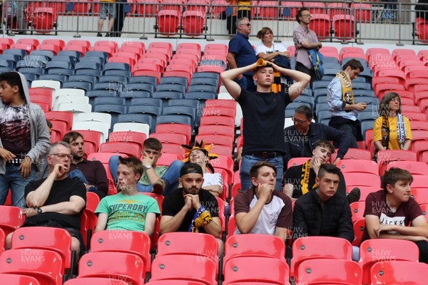 250519 - Newport County v Tranmere Rovers, Sky Bet League 2 Play-Off Final - Newport County fans react after seeing their team lose to Tranmere Rovers in the League 2 Play Off Final