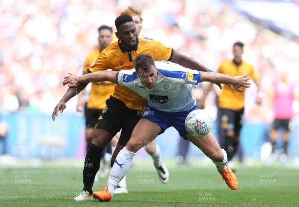 250519 - Newport County v Tranmere Rovers, Sky Bet League 2 Play-Off Final - Jamille Matt of Newport County and Liam Ridehalgh of Tranmere Rovers compete for the ball