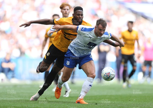 250519 - Newport County v Tranmere Rovers, Sky Bet League 2 Play-Off Final - Jamille Matt of Newport County and Liam Ridehalgh of Tranmere Rovers compete for the ball