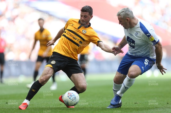 250519 - Newport County v Tranmere Rovers, Sky Bet League 2 Play-Off Final - Padraig Amond of Newport County takes on Steve McNulty of Tranmere Rovers