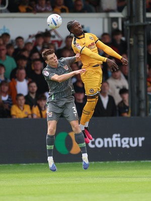 290826 Newport County v Tranmere Rovers, EFL Sky Bet League 2 - Yahya Bamba of Newport County and Jacob Slater of Tranmere Rovers compete for the ball