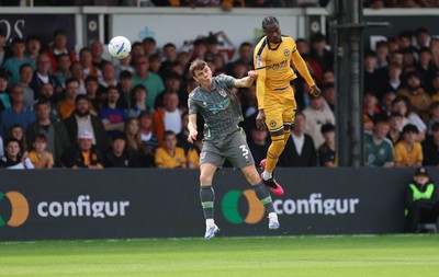 290826 Newport County v Tranmere Rovers, EFL Sky Bet League 2 - Yahya Bamba of Newport County and Jacob Slater of Tranmere Rovers compete for the ball