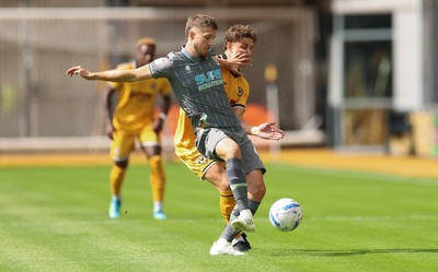 290826 Newport County v Tranmere Rovers, EFL Sky Bet League 2 - Will Vaulks of Tranmere Rovers is challenged by Harrison Biggins of Newport County