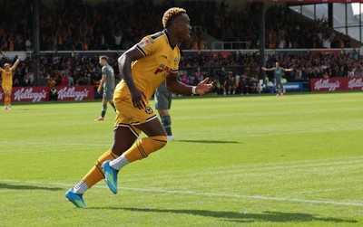 290826 Newport County v Tranmere Rovers, EFL Sky Bet League 2 - Shaquille Gwengwe of Newport County celebrates after he heads to score the opening goal
