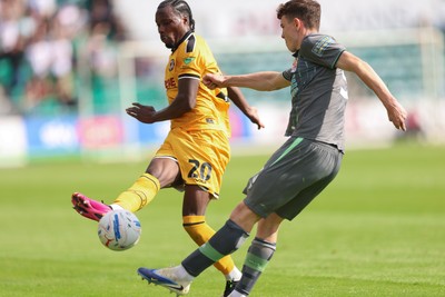 290826 Newport County v Tranmere Rovers, EFL Sky Bet League 2 - Yahya Bamba of Newport County challenges Jacob Slater of Tranmere Rovers