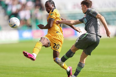 290826 Newport County v Tranmere Rovers, EFL Sky Bet League 2 - Yahya Bamba of Newport County challenges Jacob Slater of Tranmere Rovers