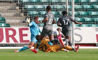 290826 Newport County v Tranmere Rovers, EFL Sky Bet League 2 - Zane Okoro of Tranmere Rovers beats Newport County goalkeeper Jordan Wright to score goal