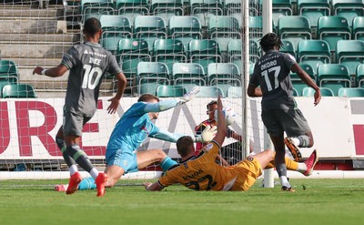 290826 Newport County v Tranmere Rovers, EFL Sky Bet League 2 - Zane Okoro of Tranmere Rovers beats Newport County goalkeeper Jordan Wright to score goal