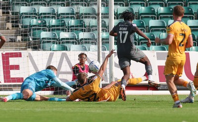 290826 Newport County v Tranmere Rovers, EFL Sky Bet League 2 - Zane Okoro of Tranmere Rovers beats Newport County goalkeeper Jordan Wright to score goal