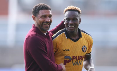 290826 Newport County v Tranmere Rovers, EFL Sky Bet League 2 - Newport County head coach Hayden Mullins with Shaquille Gwengwe of Newport County at the end of the match