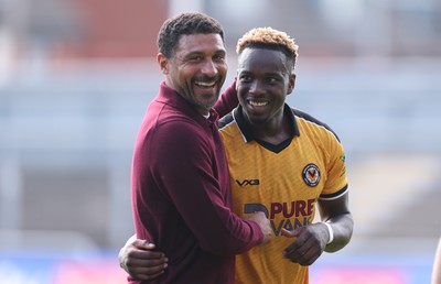 290826 Newport County v Tranmere Rovers, EFL Sky Bet League 2 - Newport County head coach Hayden Mullins with Shaquille Gwengwe of Newport County at the end of the match