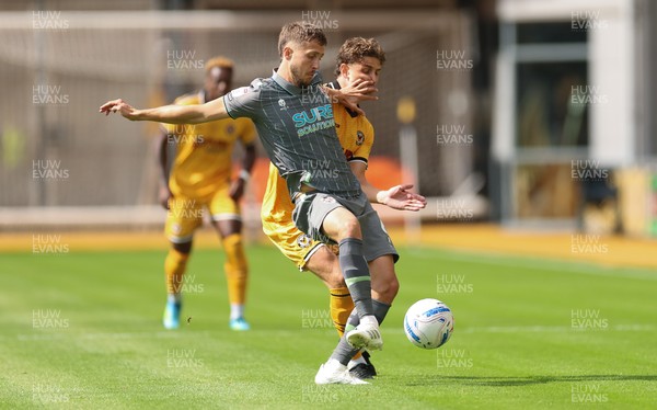 290826 Newport County v Tranmere Rovers, EFL Sky Bet League 2 - Will Vaulks of Tranmere Rovers is challenged by Harrison Biggins of Newport County