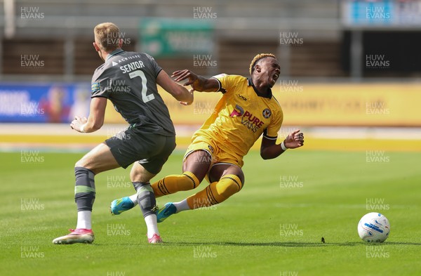 290826 Newport County v Tranmere Rovers, EFL Sky Bet League 2 - Shaquille Gwengwe of Newport County is brought down by Joel Senior of Tranmere Rovers
