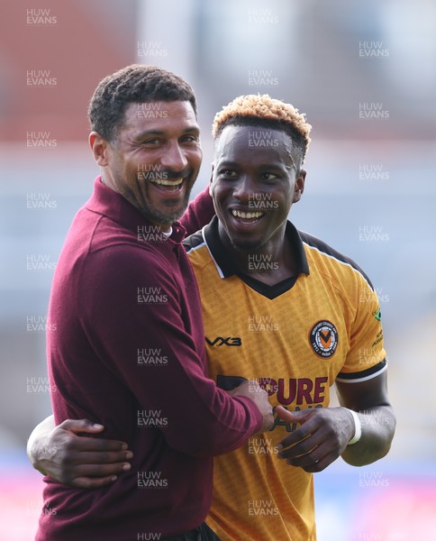 290826 Newport County v Tranmere Rovers, EFL Sky Bet League 2 - Newport County head coach Hayden Mullins with Shaquille Gwengwe of Newport County at the end of the match