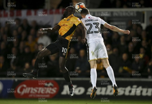 041117 - Newport County v Walsall, FA Cup First Round - Frank Nouble of Newport County and Shaun Donnellan of Walsall compete for the ball