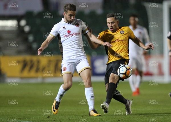 041117 - Newport County v Walsall, FA Cup First Round - Robbie Willmott of Newport County challenges Luke Leahy of Walsall