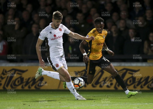 041117 - Newport County v Walsall, FA Cup First Round - Shawn McCoulsky of Newport County takes on Jon Guthrie of Walsall