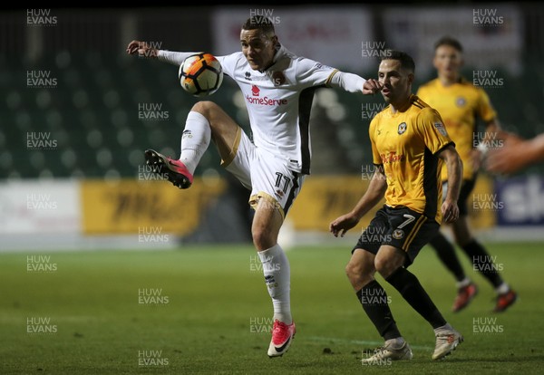 041117 - Newport County v Walsall, FA Cup First Round - Kieron Morris of Walsall wins the ball from Robbie Willmott of Newport County