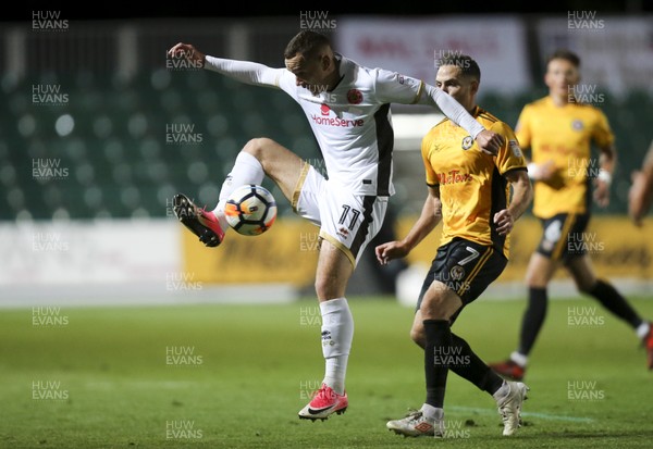 041117 - Newport County v Walsall, FA Cup First Round - Kieron Morris of Walsall wins the ball from Robbie Willmott of Newport County