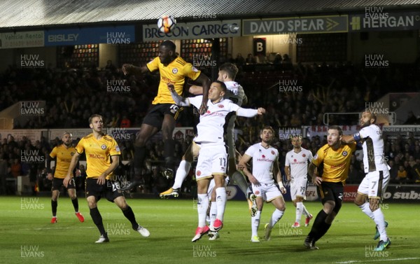 041117 - Newport County v Walsall, FA Cup First Round - Frank Nouble of Newport County gets above the Walsall defence to head the ball