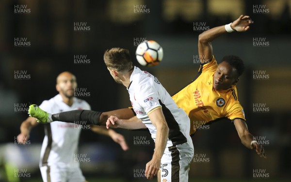 041117 - Newport County v Walsall, FA Cup First Round - Shawn McCoulsky of Newport County and Jon Guthrie of Walsall compete for the ball