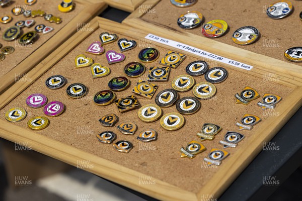 050822 - Newport County v Walsall - Sky Bet League 2 - Newport County pin badges on sale ahead of kick off