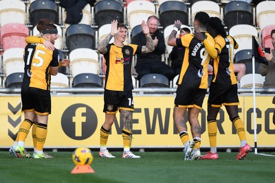 081125 - Newport County v Walsall - Sky Bet League 2 - Kai Whitmore of Newport County celebrates scoring a goal with team mates