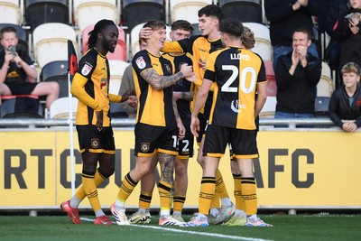 081125 - Newport County v Walsall - Sky Bet League 2 - Kai Whitmore of Newport County celebrates scoring a goal with team mates