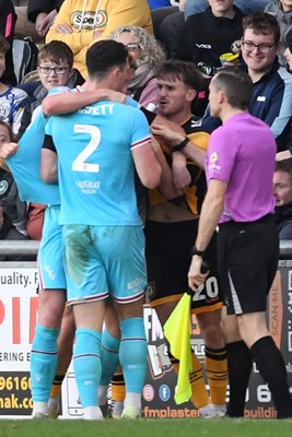081125 - Newport County v Walsall - Sky Bet League 2 - Ben Lloyd of Newport County and Connor Barrett of Walsall have a disagreement