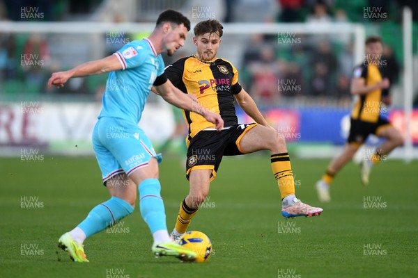 081125 - Newport County v Walsall - Sky Bet League 2 - Ben Lloyd of Newport County is challenged by Evan Weir of Walsall