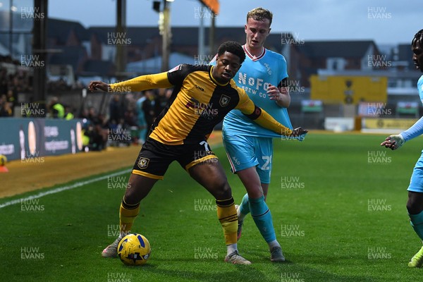 081125 - Newport County v Walsall - Sky Bet League 2 - Bobby Kamwa of Newport County is challenged by Ryan Finnigan of Walsall