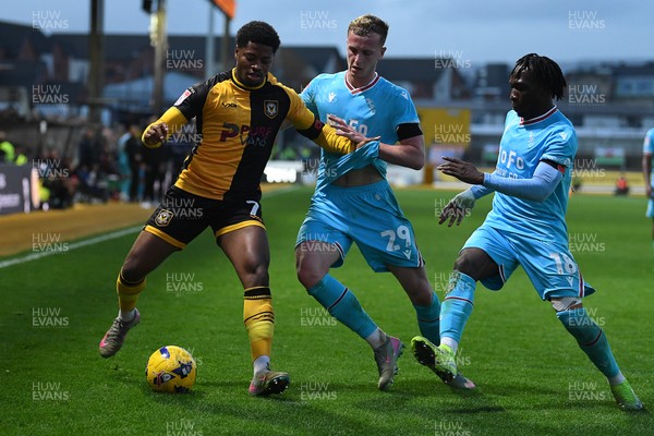 081125 - Newport County v Walsall - Sky Bet League 2 - Bobby Kamwa of Newport County is challenged by Ryan Finnigan of Walsall