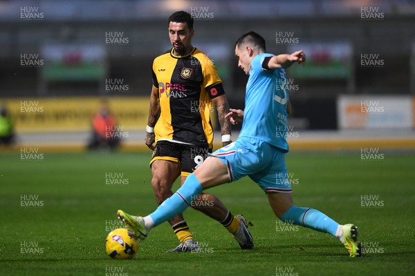 081125 - Newport County v Walsall - Sky Bet League 2 - Courtney Baker-Richardson of Newport County is challenged by Mason Hancock of Walsall